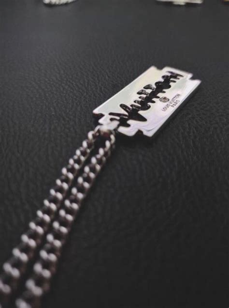 Louis Vuitton razor pendant